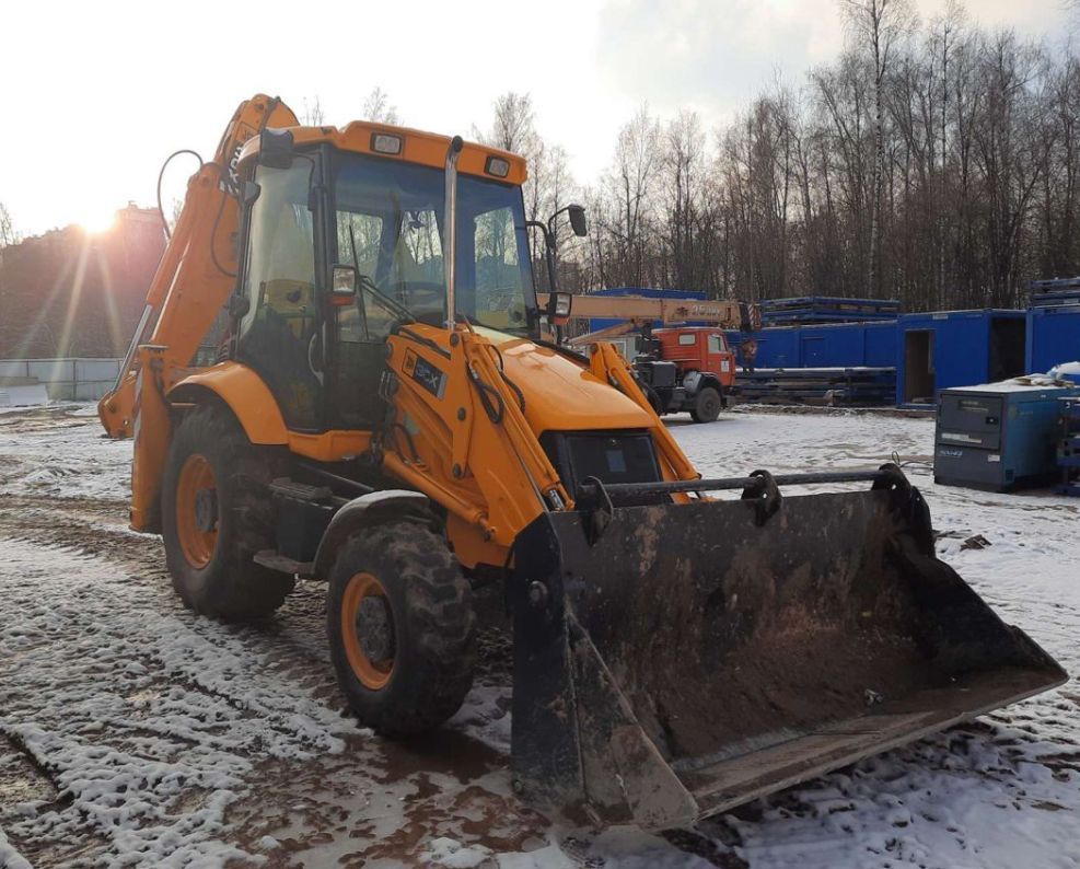 Услуги экскаватора погрузчика. Аренда погрузчика